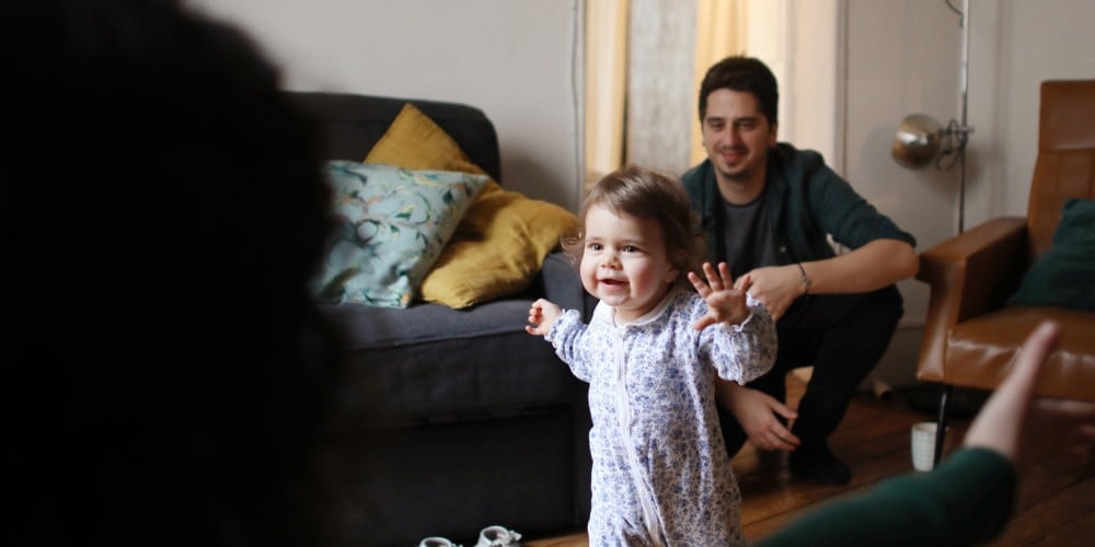 A mother hugging her four children